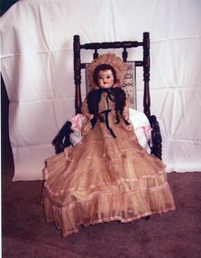 Photograph, Small version of "Shurle" Doll loaned by Elinor Musumeci  -- Coloured