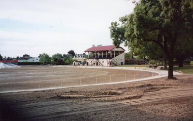 Photograph, Central Park Stawell during renovation and extension of the oval with Grandstand -- Coloured