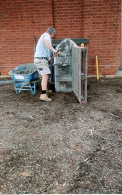 Photograph, Waites Robson Stonemasons, Installation of Old Headstone at the Stawell Historical Offices by Paul Cuffe, donated by Barry Marx of Ararat