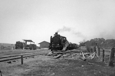 Photograph, T Murray, Navarre Railway Station with steam train leaving station with Old sleepers in foreground 1953, 16/12/1953