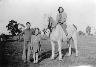 Photograph, Isobel Drefke on horse with her two children