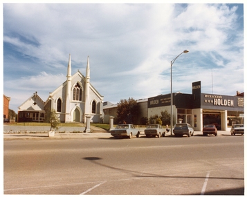 Photograph, Pleasant Creek Special School, November 1975,  Methodist Church and McCracken's Holden Dealership, Nov 1975