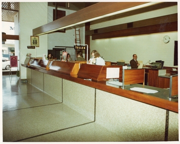 Photograph, Pleasant Creek Special School, November 1975,  State Savings Bank Interior. Staff left to right Kaye Baxendale ? ? Bob Freeland with long blond hair, ? Jones, Nov 1975