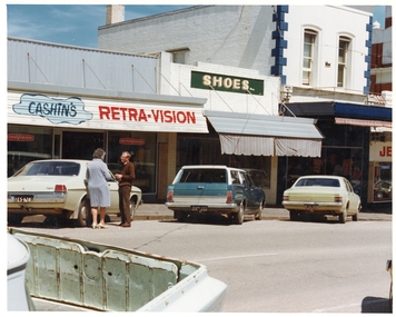 Photograph, Pleasant Creek Special School, Glyn & Cynthia Cashin Electrical, Shoe Shop, Norm Osbornes Shop, Francis Latus Jewelers Mov 1975, Nov 1975
