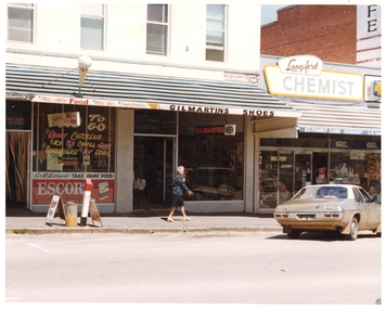 Photograph, Pleasant Creek Special School, Shuttlesworth's Milk Bar,  Gilmartin's Shoes, Langford's Chemist Nov 1975, Nov 1975