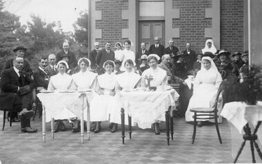 Photograph, Nurses, Committee & Wives seated at a function at the Pleasant Creek Hospital 1918, c1917