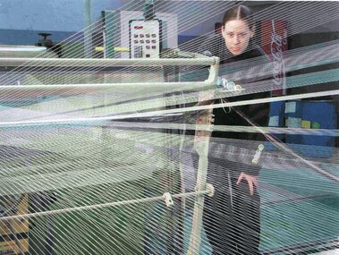 Photograph - Aunde Album 29, Watching yarn in weaving machine, 2002