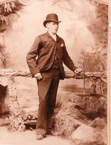 Photograph, Studio Portrait of Gentleman with suit hat and riding crop
