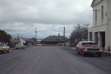 Slide, Ian McCann, House butting into centre of Scallan and Byrne street intersection later demolished.    Old Fire Station on right