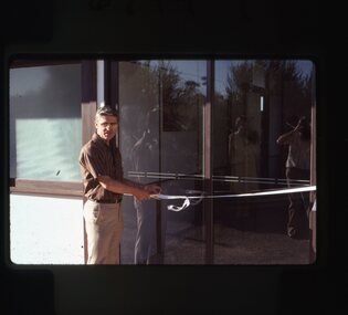 Slide, Ian McCann, Cutting the ribbon