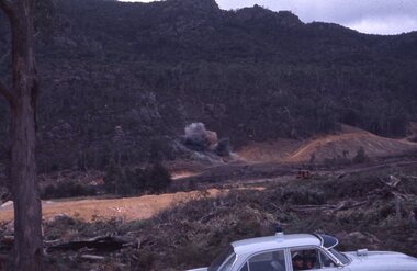 Slide, Ian McCann, Lake Bellfied showing explosion from the road, 1960's