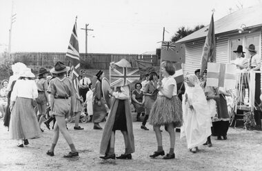 Photograph, Parade of Girl Guides in dress up in front of Guide Hall