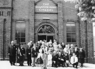 Photograph, Group in front of Salvation Army Citadel