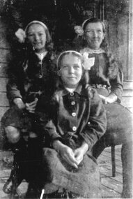 Photograph, Three Cragg sisters on verandah. c1908