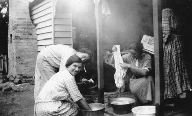 Photograph, Cragg sisters on washing day.  c1925