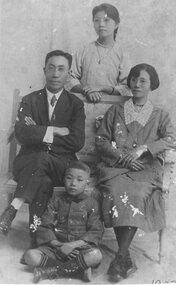 Photograph, Fred C Mow Fung seated with wife and daughter Anna 1923 - Anna Goh Collection