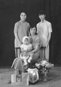 Photograph, Edith Mow Fung sitting holding Anna. Left Anna Mow Fung. Right Cousin Sister 1937 - Anna Goh Collection