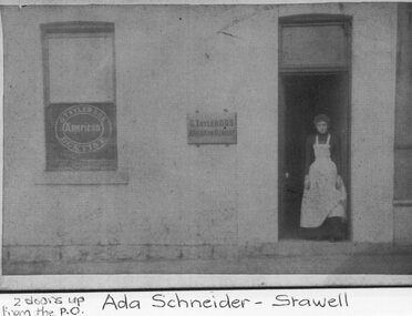 Photograph, Ada Schneider standing in doorway of G. Tayler (DDS) American Dentistry c1895