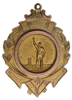 Obverse view, clearly showing wreath design and cricketer