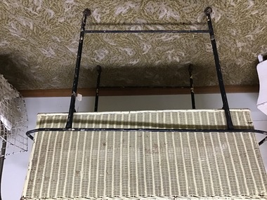 Cream cot in black stand and wheels, Cot - Nursery