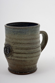 Pottery (mug): Alma Shanahan (b.1923 - d.2015 Vic, AUS), Green Mug, pressed decoration