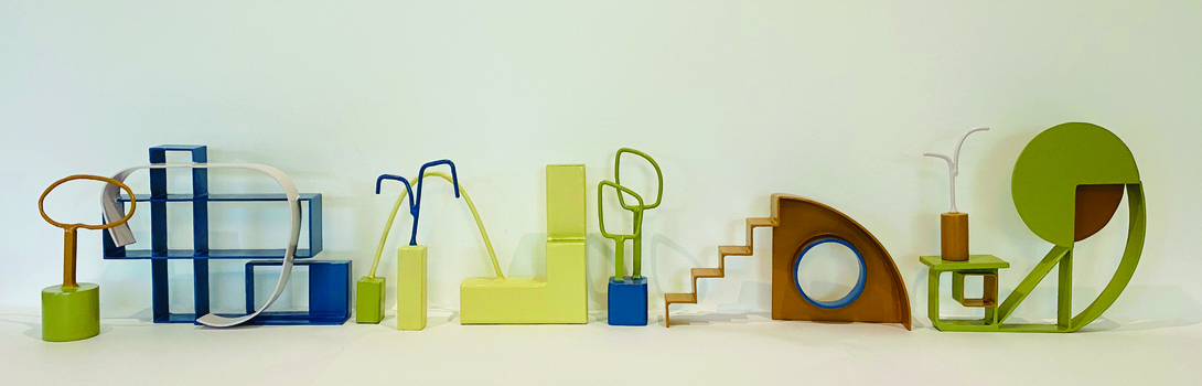 A series of 8 small three-dimensional sculptures of varying dimensions, made from painted steel. Each sculpture is roughly 25cm tall, and consists of abstract geometric shapes. The colour palette consists of muted green, brown, blue and yellow.