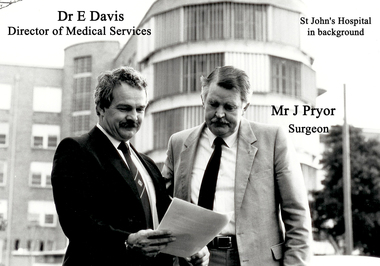 Dr E Davies, Mr Pryor, St John of God Hospital in background