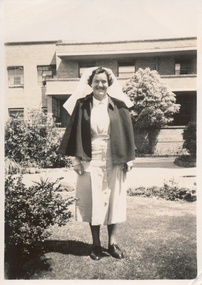 Sr Jean Harris, Tutor, in front of Edward Wilson Block