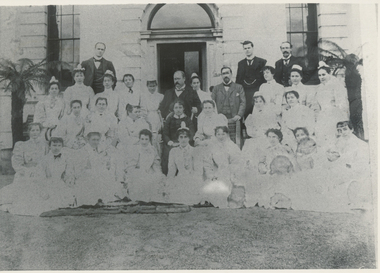 1901 Group - Mrs Eagleton, Matron - Nurses & Sisters. Mr Eagleton, husband behind Matron - in Frame