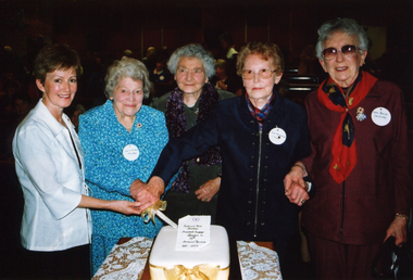 75th Annual Reunion, 2003 - Cutting the cake. President, Trish Twaits