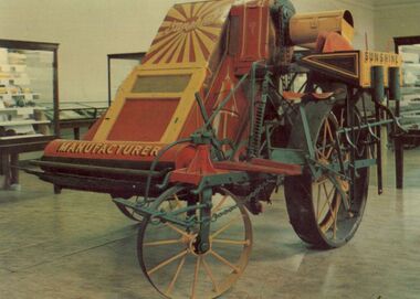 Photograph - Early stripper harvester, 1986