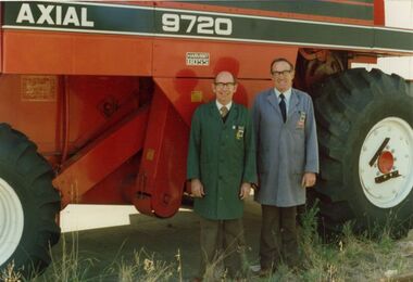 Photograph - Mr Eddie Jenkins and Mr Ron Donaldson alongside a self-propelled header on 3 March 1987, [mid 1980s]