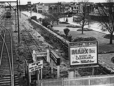 Photograph - Sunshine Gardens Bendigo line McKay factory clock Business shops Roadway of Hampshire Road and Sunshine Theatre Billboard Photograph, Late 1940s