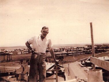 Photograph - Edward Lloyd on scaffolding overlooking Sunshine, c. Late 1930s - Early 1940's