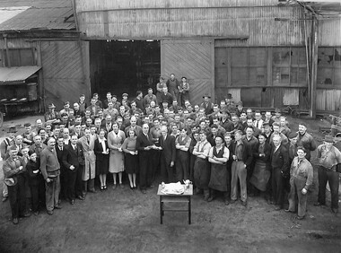 Photograph - Group of employees standing outside unknown factory, Sutcliffe Ptd Ltd Commercial Photographer