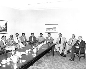 Photograph - Ken Porter Collection - Massey Ferguson Men Sitting Around Boardroom Table On McKay's Chairs Photograph