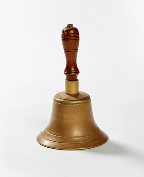 Brass bell with a turned wood handle.