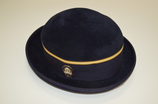 Navy blue felt bowler style hat with ribbon hat band. 