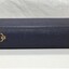 Side view of book showing gilt lettering  "STEEDMAN'S MANUAL OF SWIMMING" at the top of the spine and a price of 5 shillings, also gilt, at the bottom of the spine.