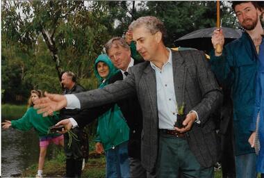 Throwing water plants into the wetlands, Darebin Parklands Association, 1993