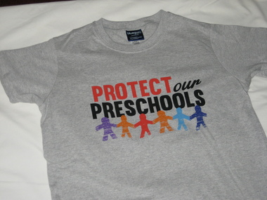 Tshirt and newspaper articles, Teacher strike causes 50 kinders to shut down and another 450 to run limited services 22 October 2014