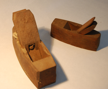 Two wooden carpenter's planes used by local craftsmen
