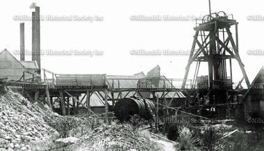 Diamond Creek Gold Mine showing poppet head and mullock heaps