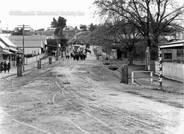 Photograph - Black & white photograph, Diamond Creek Brass Band march down Chute Street 1916