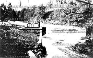 Concrete weir across Watts River