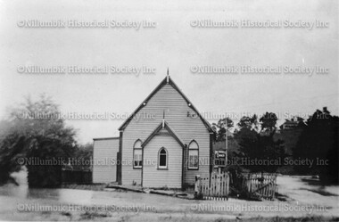 First Methodist Church Diamond Creek in its original location surrounded by flood waters