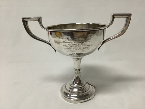 EPNS chalice-shaped trophy with two handles, with the inscription: "Mentone Street March competition 16 February 1930/by Mentone citizens band/who presented it to Williamstown city band/the winners of second place"