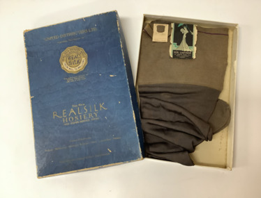 Pair of ladies grey/brown silk stockings, in original box with a blue lid and gold text.  