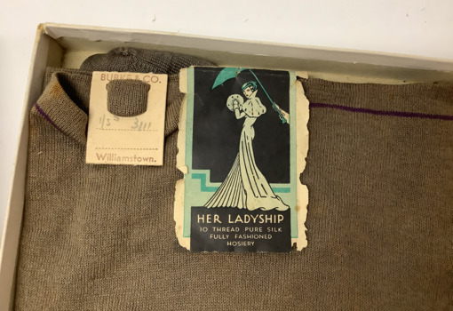 Pair of ladies grey/brown silk stockings, in original box with a blue lid and gold text.  