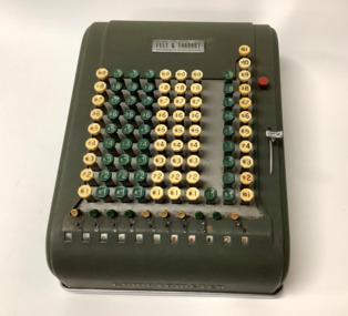 Large, heavy key driven mechanical calculator with a detachable leatherette dust cover.